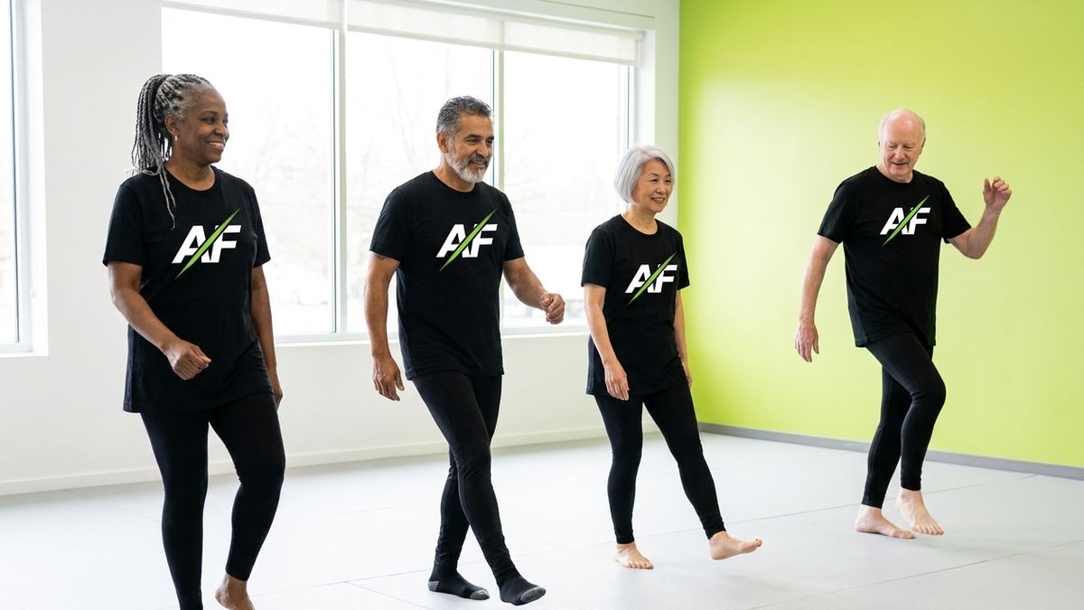 Low-impact grounded cardio in an Active Fit 55+ class, feet staying on the floor